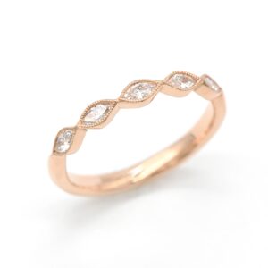 Bague Marquises en rivière en or rose sertie de 5 diamants